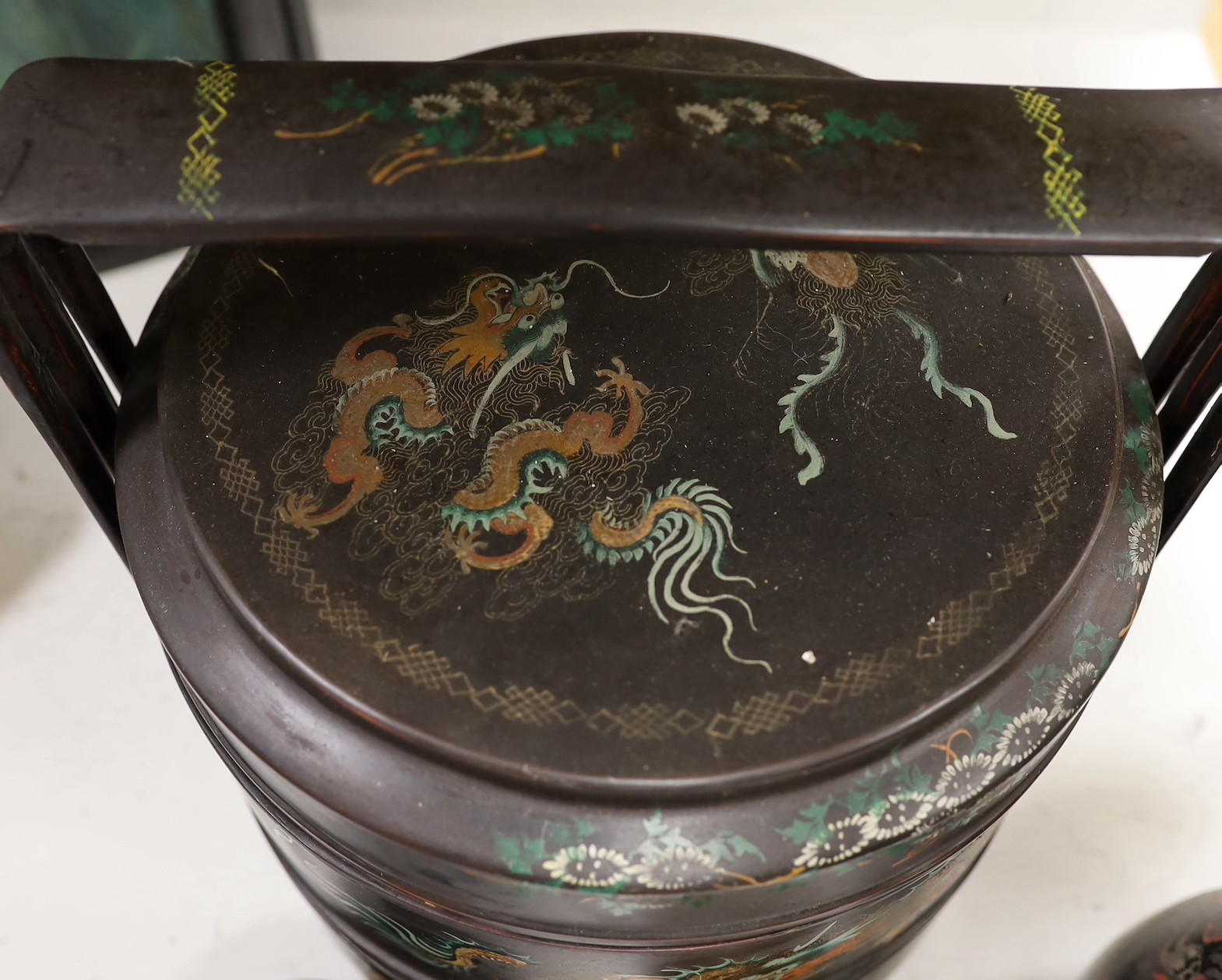 A Chinese Fuzhou lacquer ‘dragon’ wedding basket, 31cm high together with a similar teaset